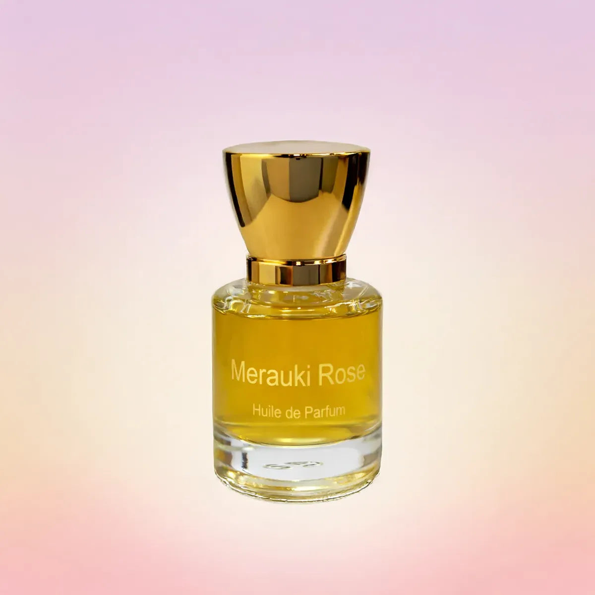 Merauki Rose huile de parfum bottle with warm golden tones on a soft pink gradient backdrop