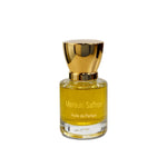 Merauki Saffron perfume bottle with rich amber tones on clean white background