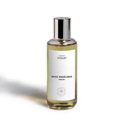 Musc Angélique by Maison Violet perfume bottle with silver cap on white background
