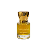 Patchouli Wood perfume bottle with rich amber tones on clean white background