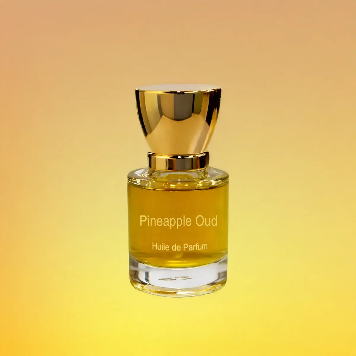Pineapple Oud huile de parfum bottle with gold cap on warm yellow gradient background